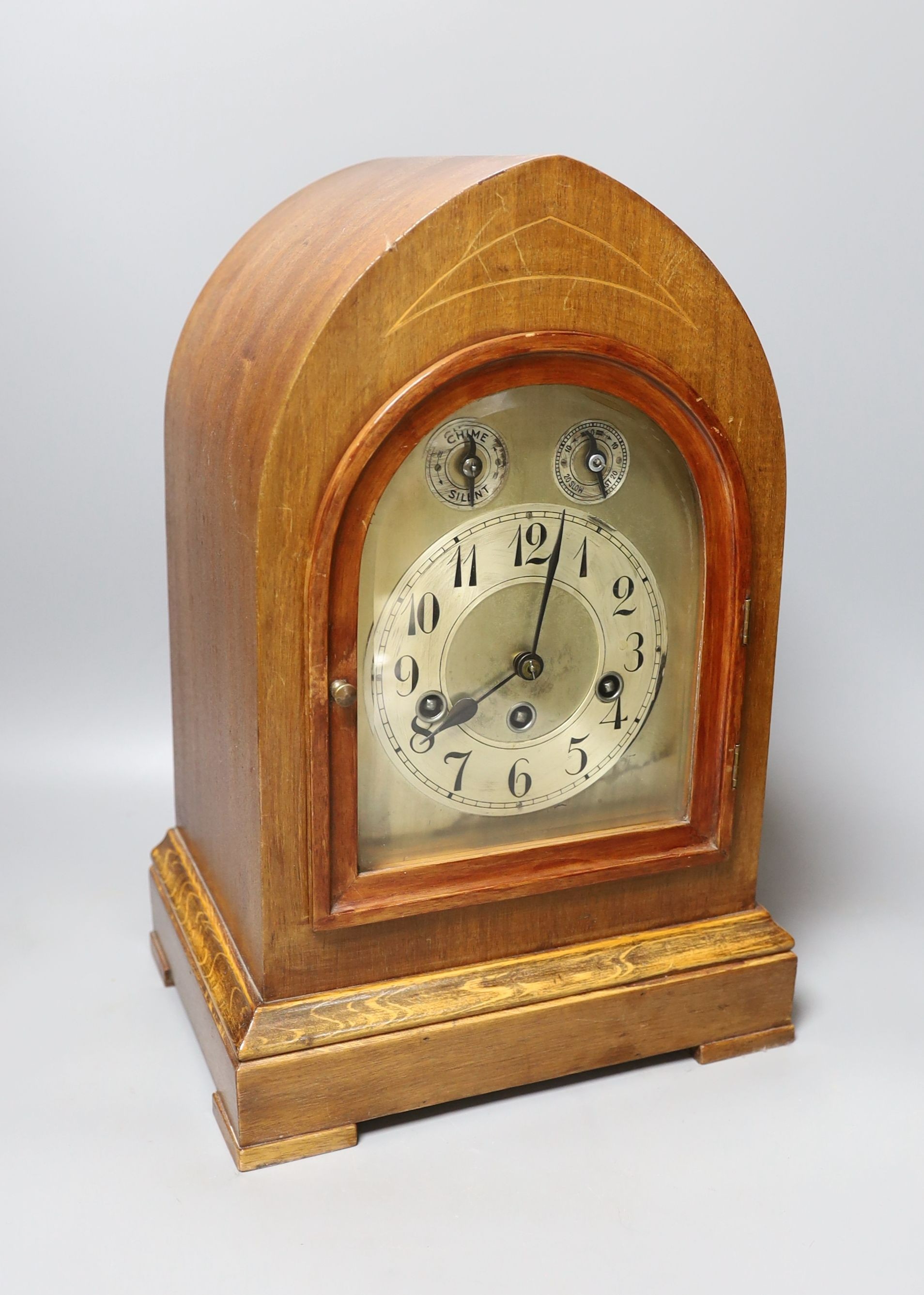 An wooden cased Junghans chime mantel clock